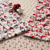 Christmas fabrics with gnomes, snowmen, Santa and reindeer in red tones